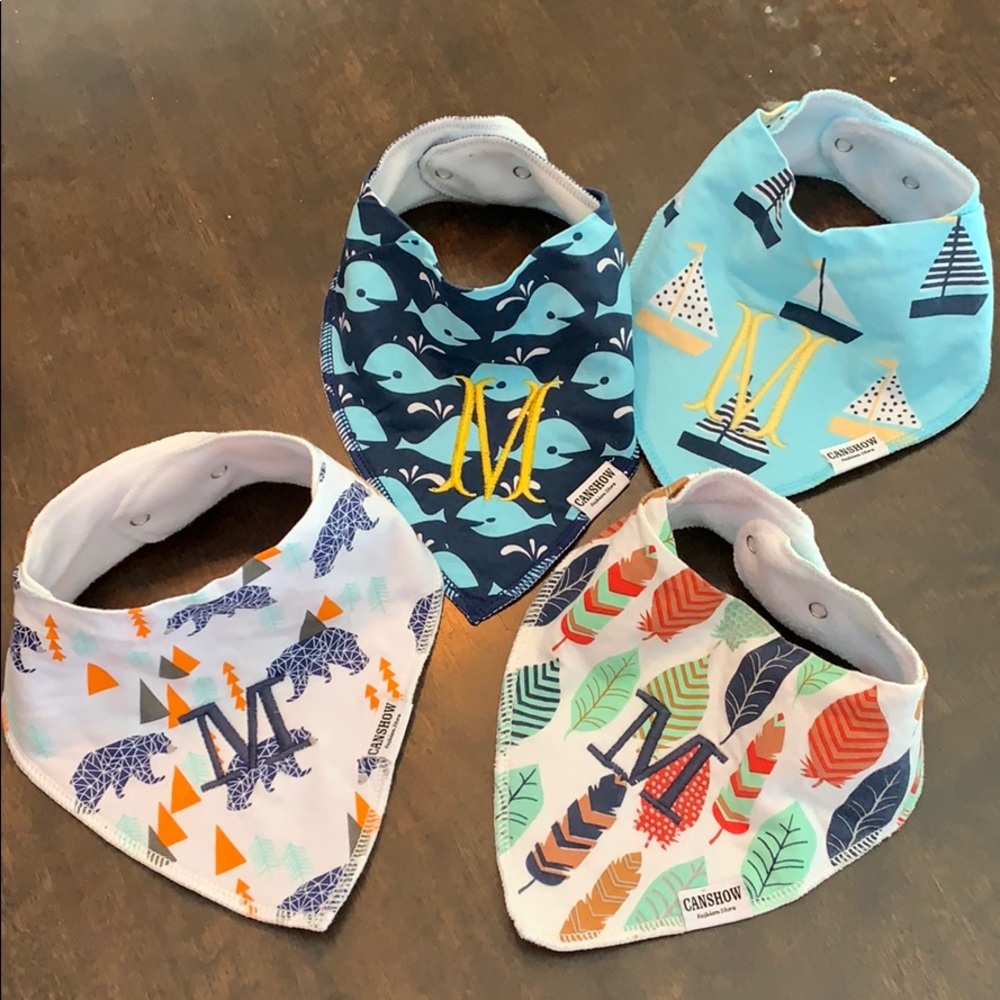 Bandana style bibs “M” monogram. Washed not worn
